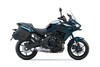 Side angle of a motorcycle staged in a white studio background.