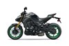 Side angle of a motorcycle staged in a white studio background.