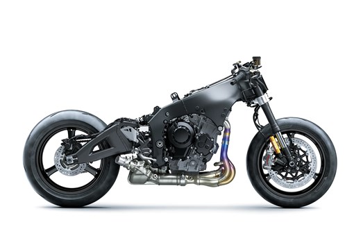 Profile angle of the frame and tires a motorcycle staged in a white studio background. opens in a new window