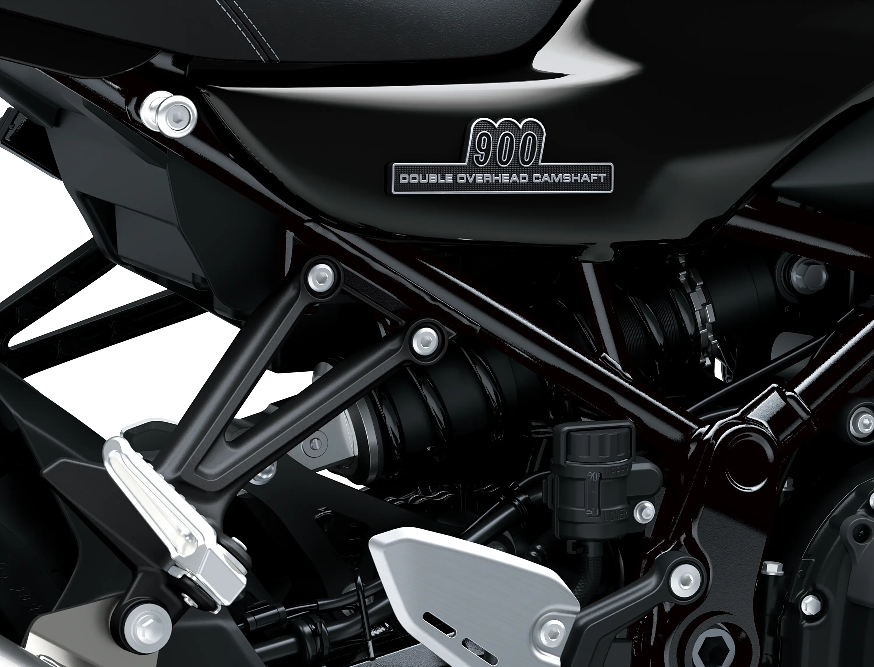 Close-up of the frame of a motorcycle staged in a white studio background.