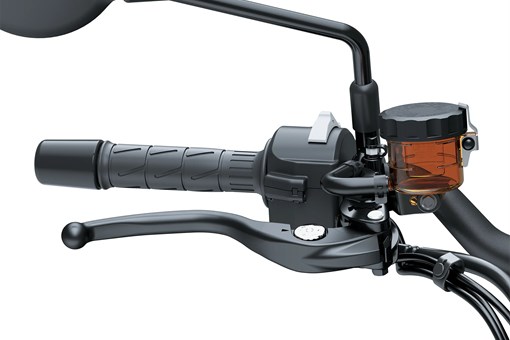 Close-up of the left handlebar of a motorcycle staged in a white studio background. opens in a new window