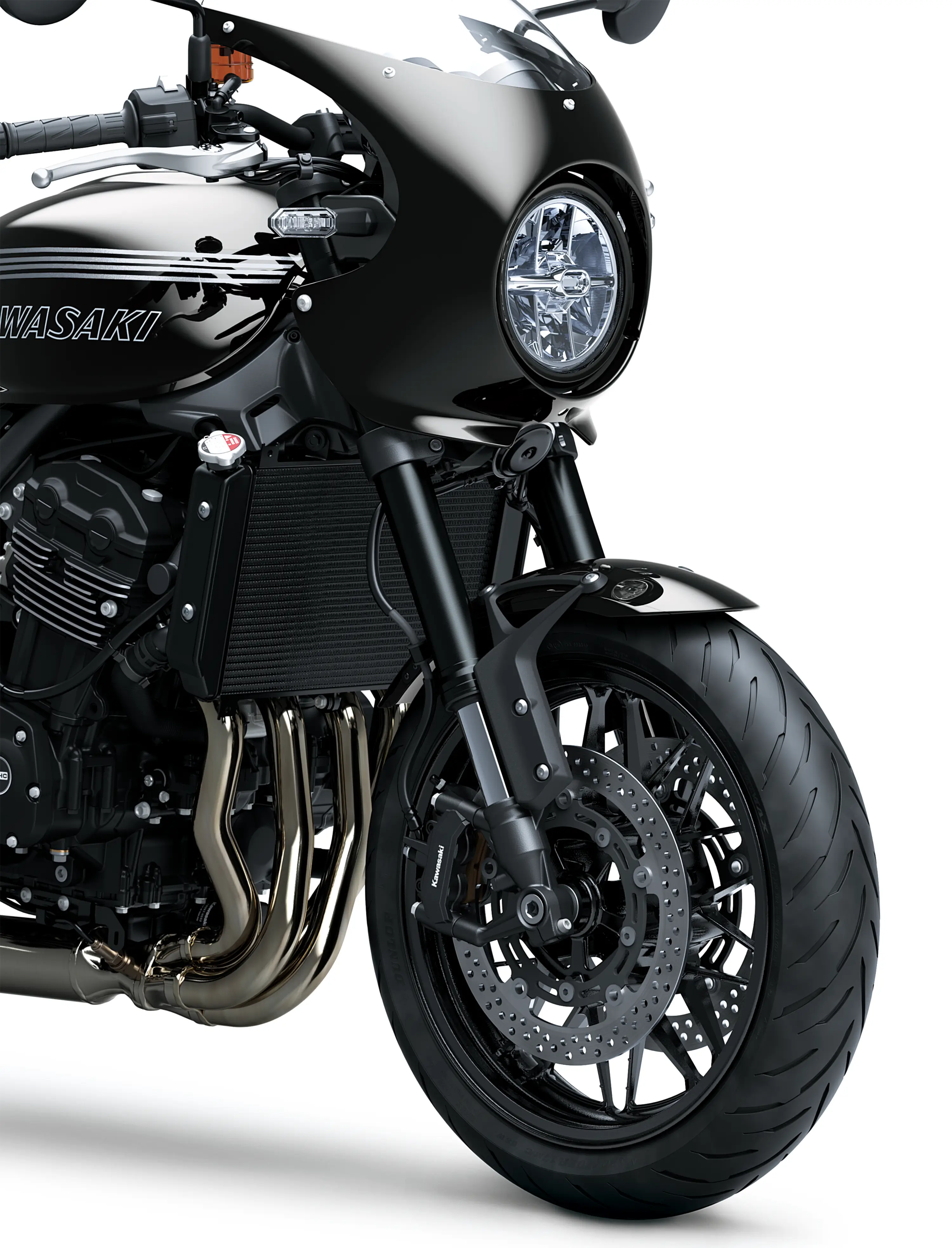 Close-up of the front-end of a motorcycle staged in a white studio background.