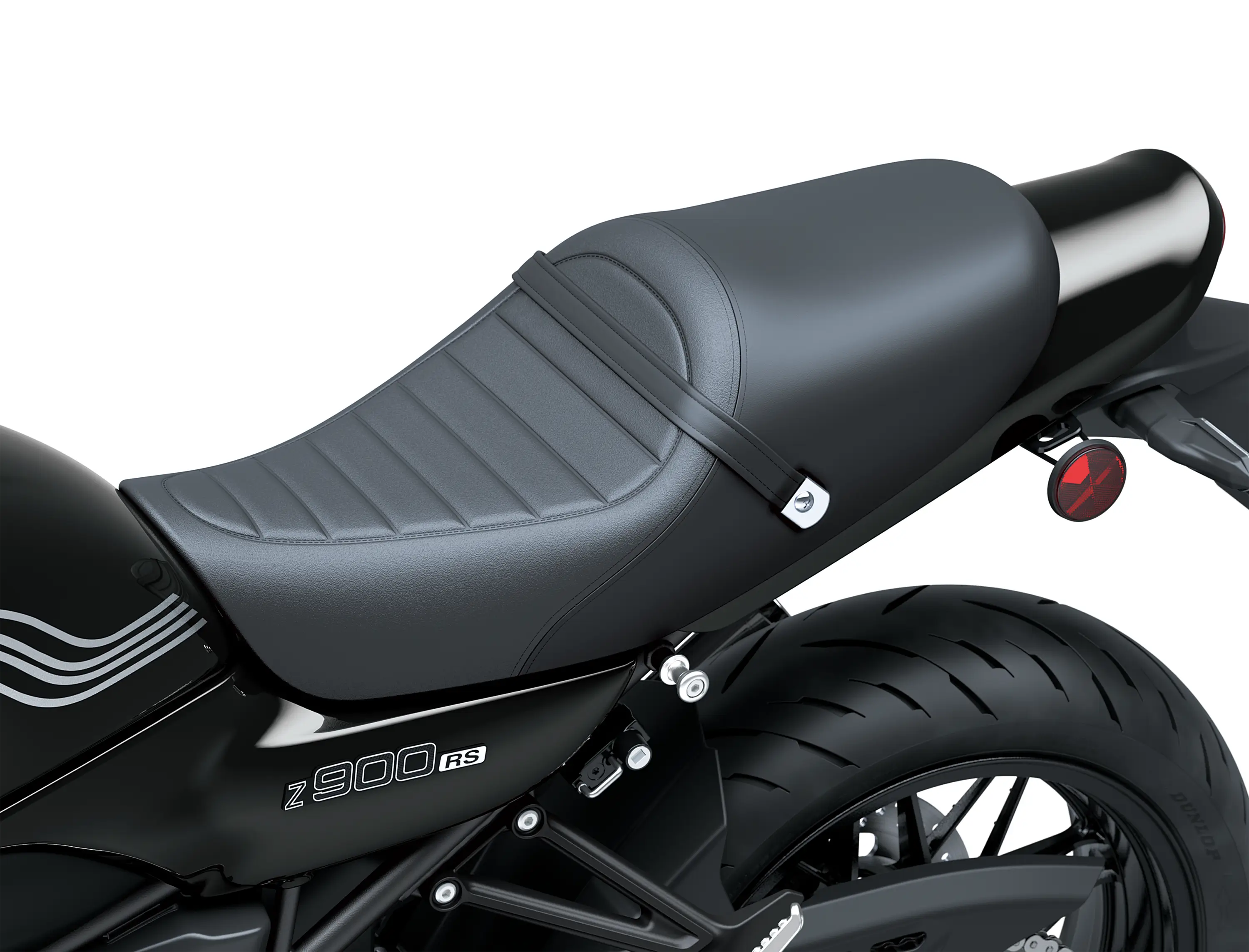 Close-up of the seat of a motorcycle staged in a white studio background.