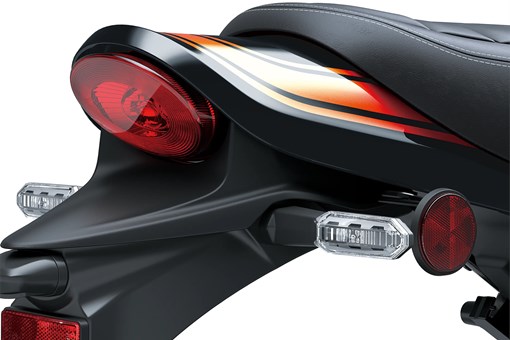 Close-up of the rear fender of a motorcycle staged in a white studio background. opens in a new window