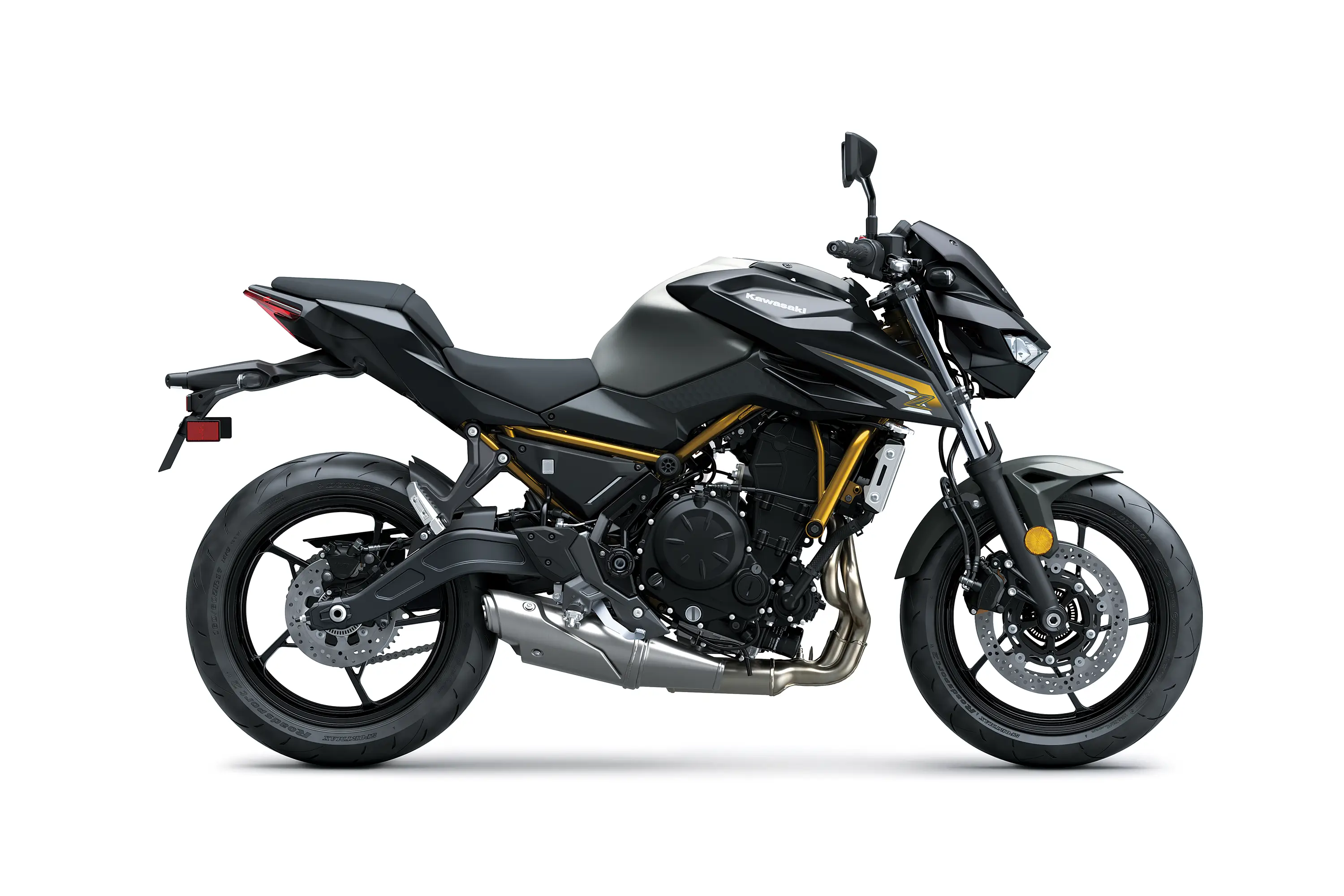 Profile angle of a motorcycle staged in a white studio background.