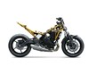 Profile angle of a naked motorcycle staged in a white studio background.