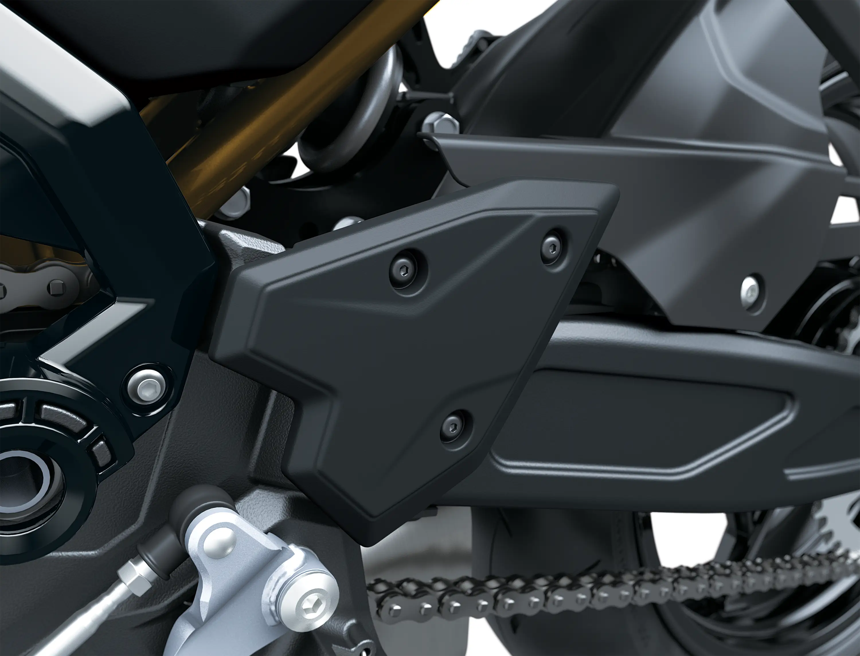 Chain of a motorcycle staged in a white studio background.