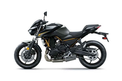 Profile angle of a motorcycle staged in a white studio background. opens in a new window
