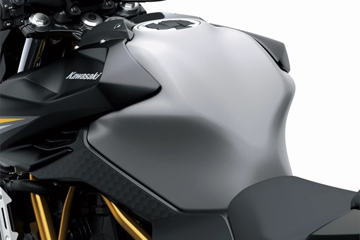 Tank of a motorcycle staged in a white studio background. opens in a new window