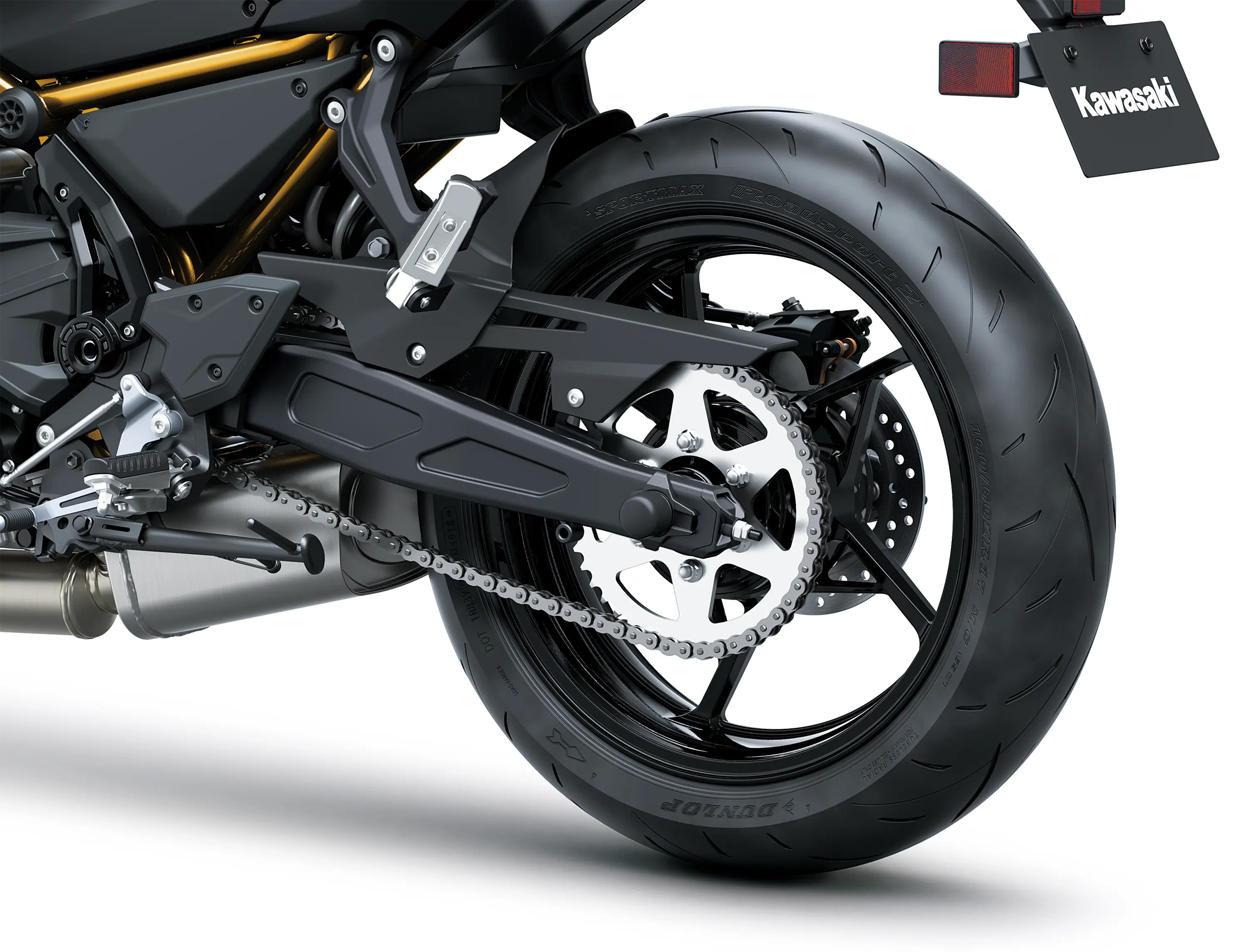 Rear wheel of a motorcycle staged in a white studio background.