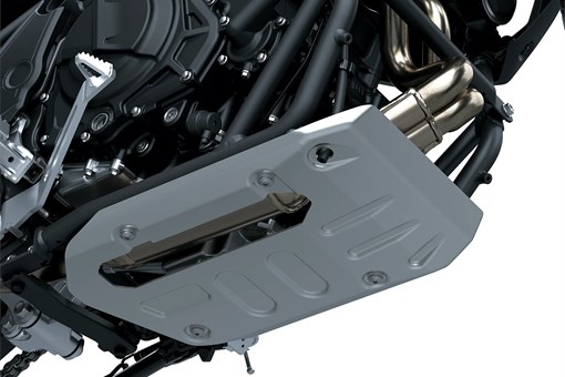 Underside of a motorcycle staged in a white studio background. opens in a new window