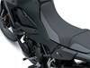 Rider seat of a motorcycle staged in a white studio background.