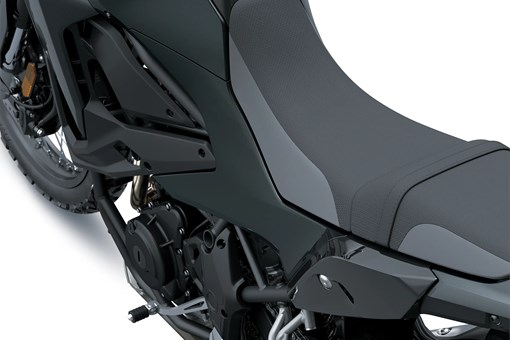 Rider seat of a motorcycle staged in a white studio background. opens in a new window