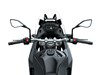 Rider angle of a motorcycle staged in a white studio background.