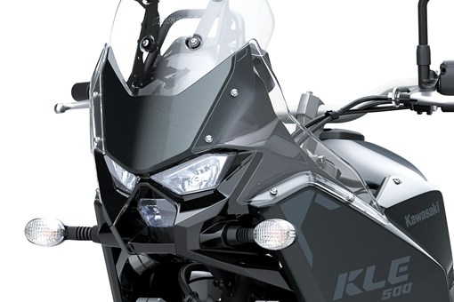 Front close angle of a motorcycle staged in a white studio background. opens in a new window