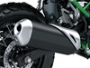 Exhaust pipe of a motorcycle staged in a white studio background.