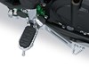 Foot peg of a motorcycle staged in a white studio background.