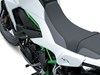Closeup on seat of a motorcycle staged in a white studio background.
