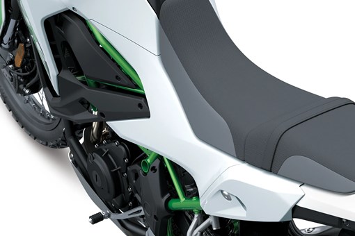 Closeup on seat of a motorcycle staged in a white studio background. opens in a new window