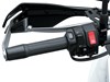 Other handlebar of a motorcycle staged in a white studio background.