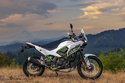 Side angle of a motorcycle parked off-road. opens in a new window