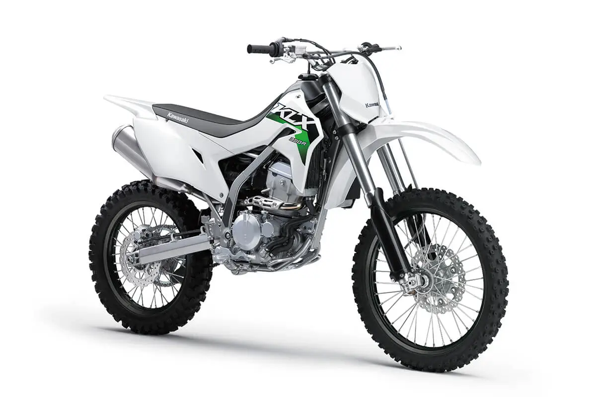 Three-quarter front angle of a silver motorcycle staged in a white studio background.