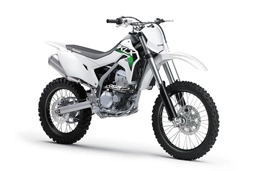 Three-quarter front angle of a silver motorcycle staged in a white studio background. opens in a new window