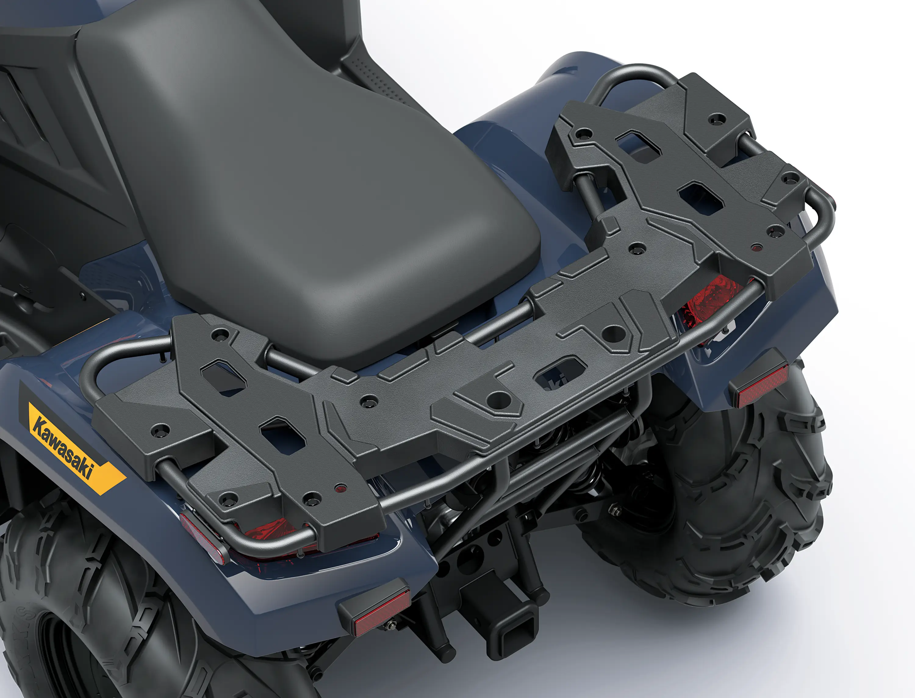 Close-up of the rear cargo rack of an ATV staged in a white studio background.