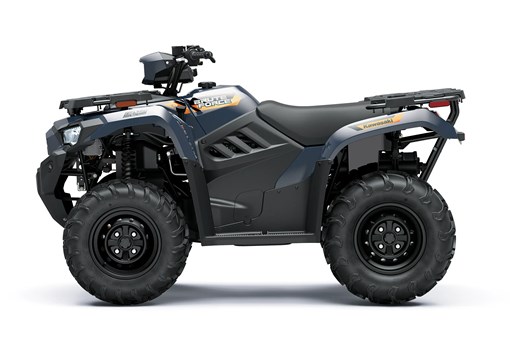 Side angle of a blue ATV staged in a white studio background. opens in a new window