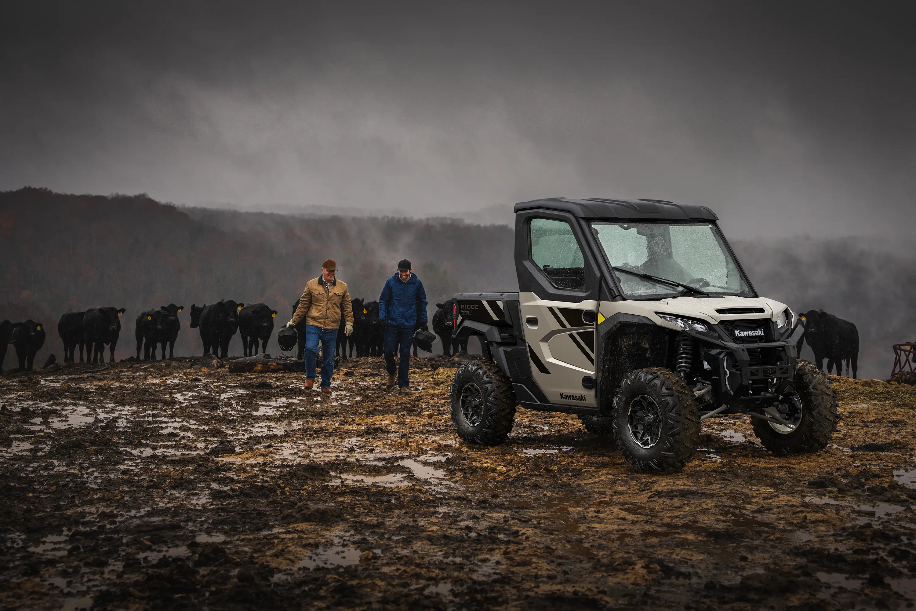 Three-quarter front angle of a side x side parked off-road.