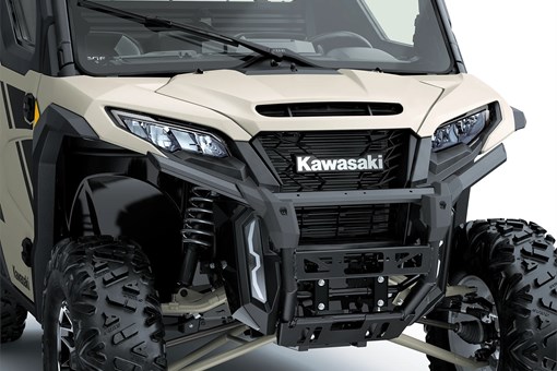 Close-up of the front end of a side x side in a white studio background. opens in a new window