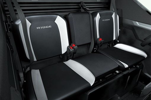 Close-up of bench seating in a side x side. opens in a new window