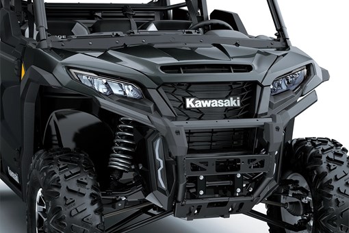 Close-up of the front end of a side x side in a white studio background. opens in a new window