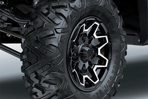 Close-up of a tire of a side x side in a white studio background. opens in a new window