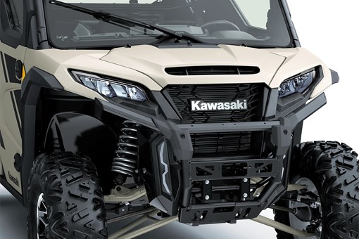 Close-up of the front end of a side x side in a white studio background. opens in a new window