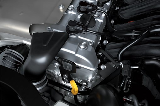 Close-up of the engine bay of a side x side. opens in a new window