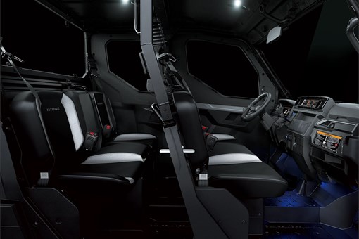 Profile view of the 2-row seating in a side x side. opens in a new window