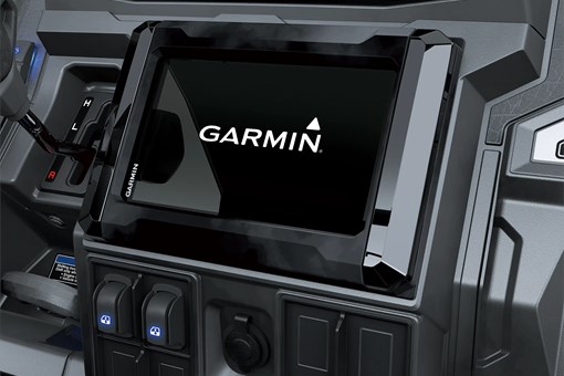 Close-up of the Garmin infotainment screen in a side x side. opens in a new window