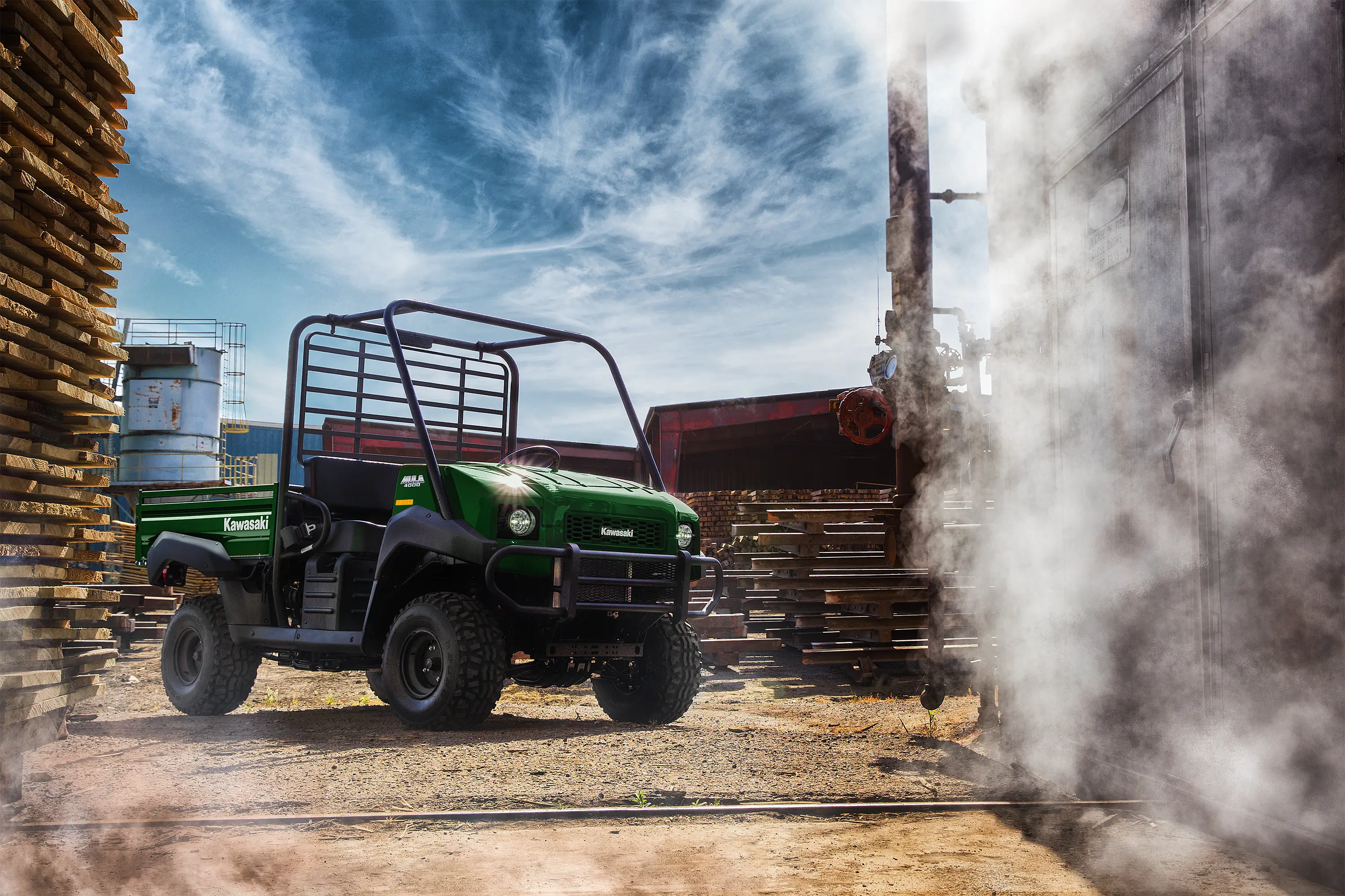 Three-quarter front angle of a side x side parked off-road.