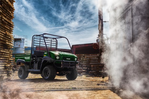 Three-quarter front angle of a side x side parked off-road. opens in a new window