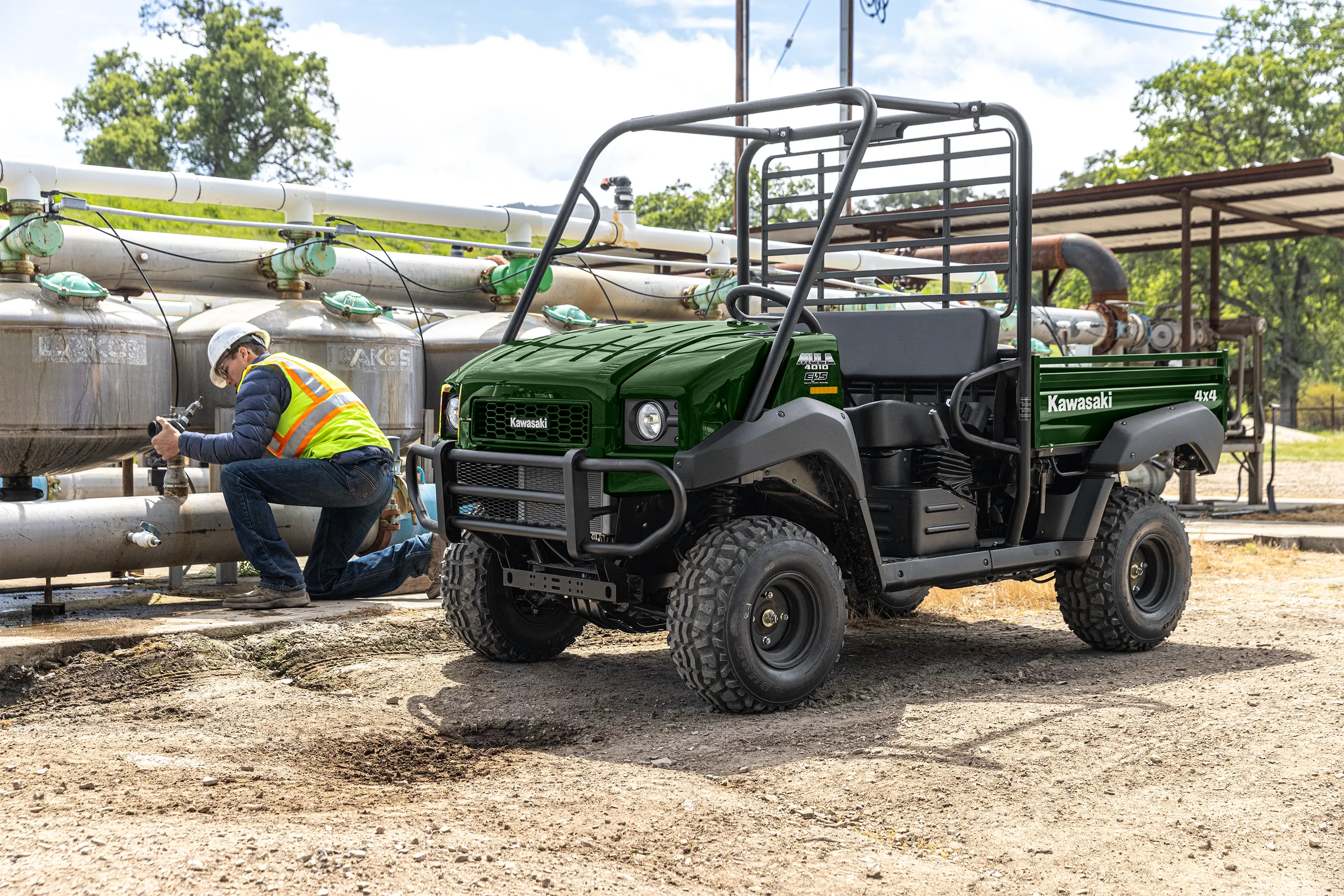 Three-quarter front angle of a side x side parked off-road.