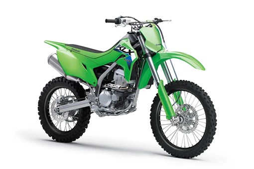 Front three-quarter view of a green dirt bike in a white studio background. opens in a new window
