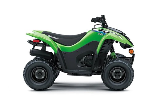 Right side view of a green youth ATV staged in a white studio background. opens in a new window