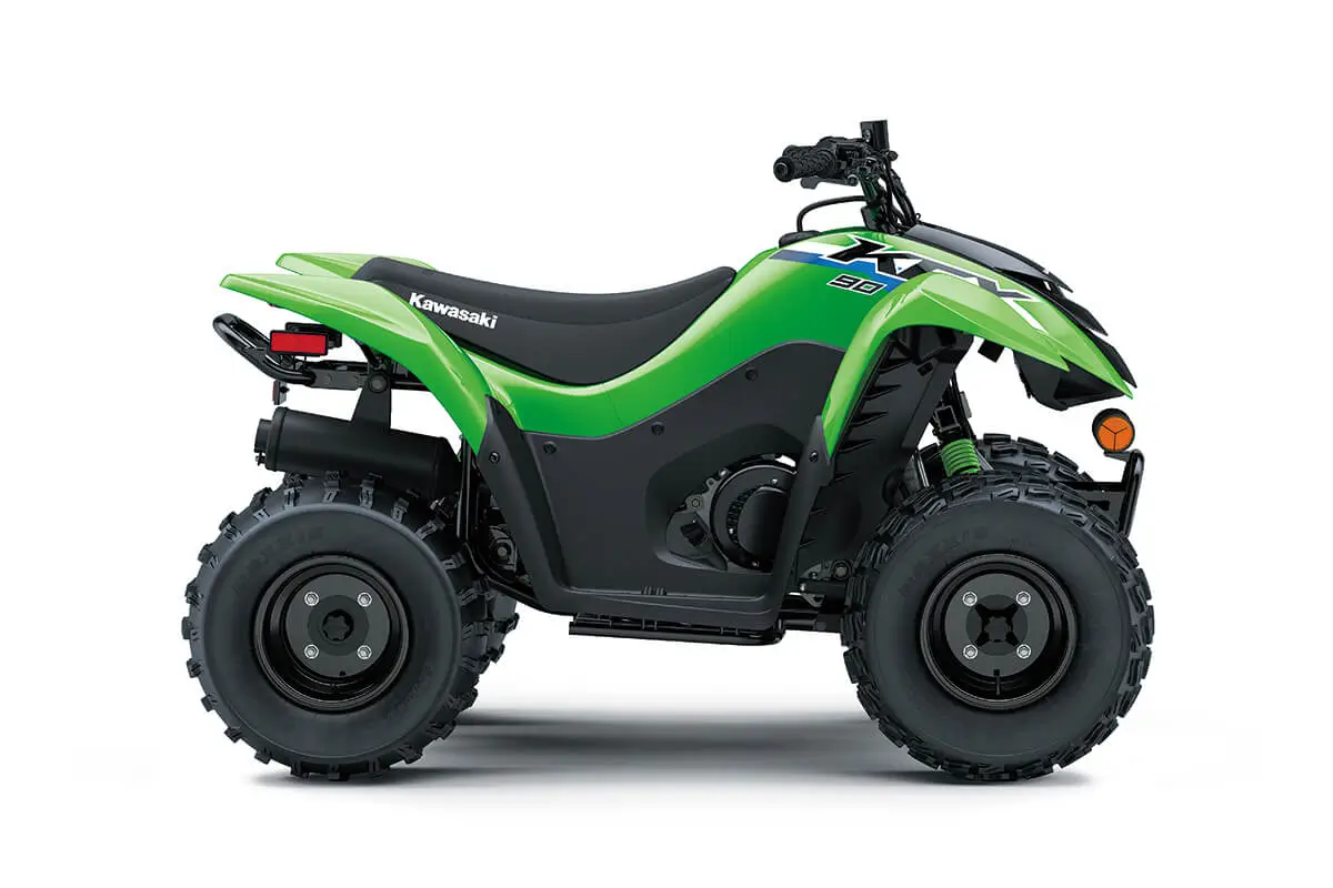 Right side view of a green youth ATV staged in a white studio background.