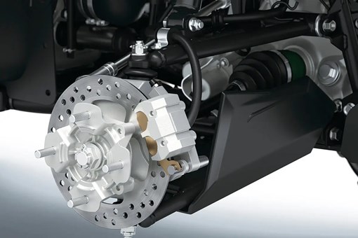 Detail view of the disc brakes of a utility ATV in a white studio background. opens in a new window