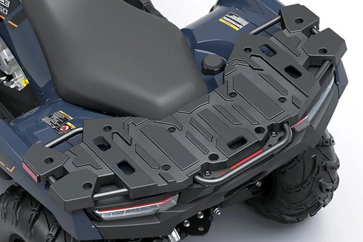 Detail view of a rear storage rack on a utility ATV in a white studio background. opens in a new window