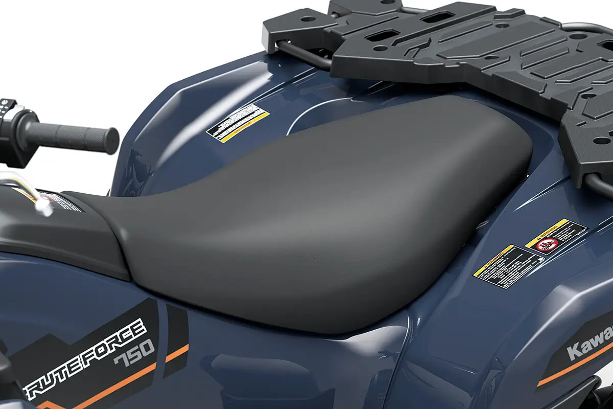 Detail view of the seat on a utility ATV in a white studio background.