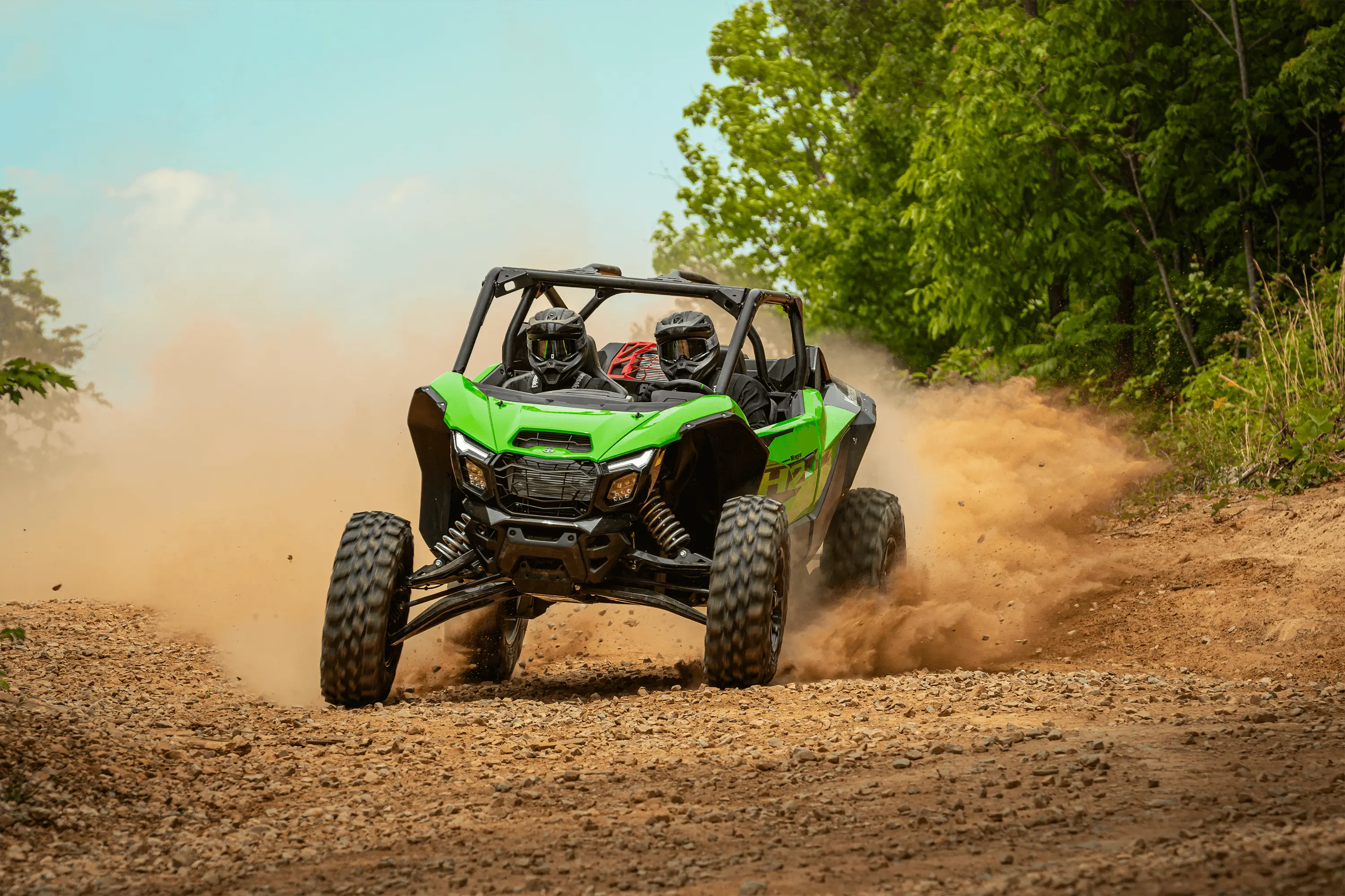 Three-quarter front angle of a person sliding a side x side off-road.