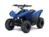 Three-quarter front angle of an ATV displayed in a white studio background.
