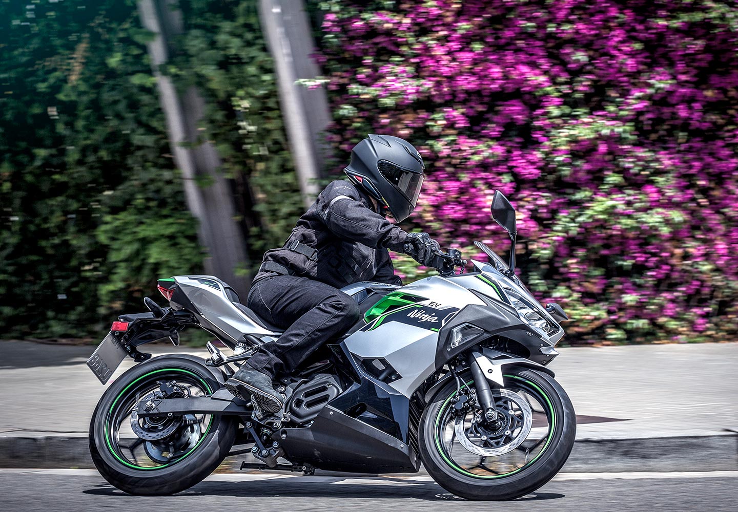 Rider riding an electric Ninja motorcycle